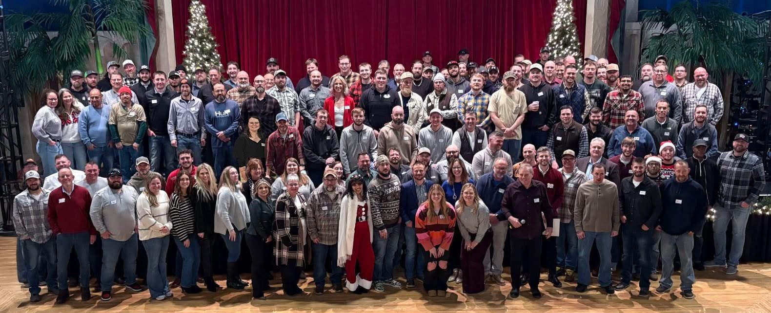 Jeff Luberski with construction team at company event